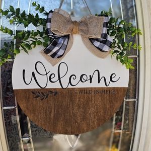 Welcome it's wild in here sign